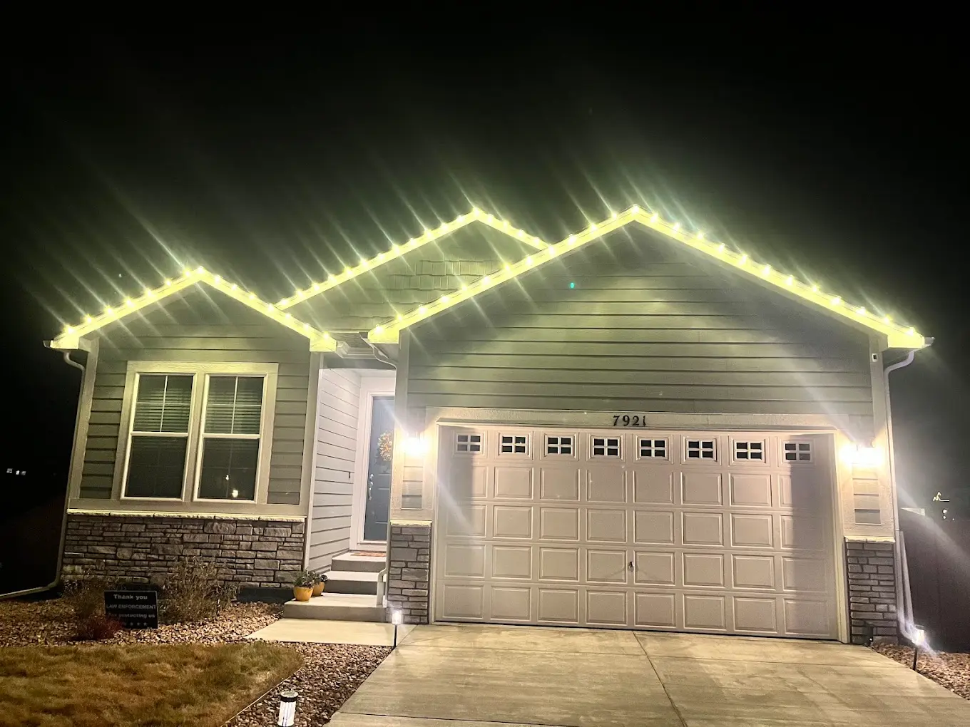 Front Range portfolio: warm white LED roofline lights on a single-family home